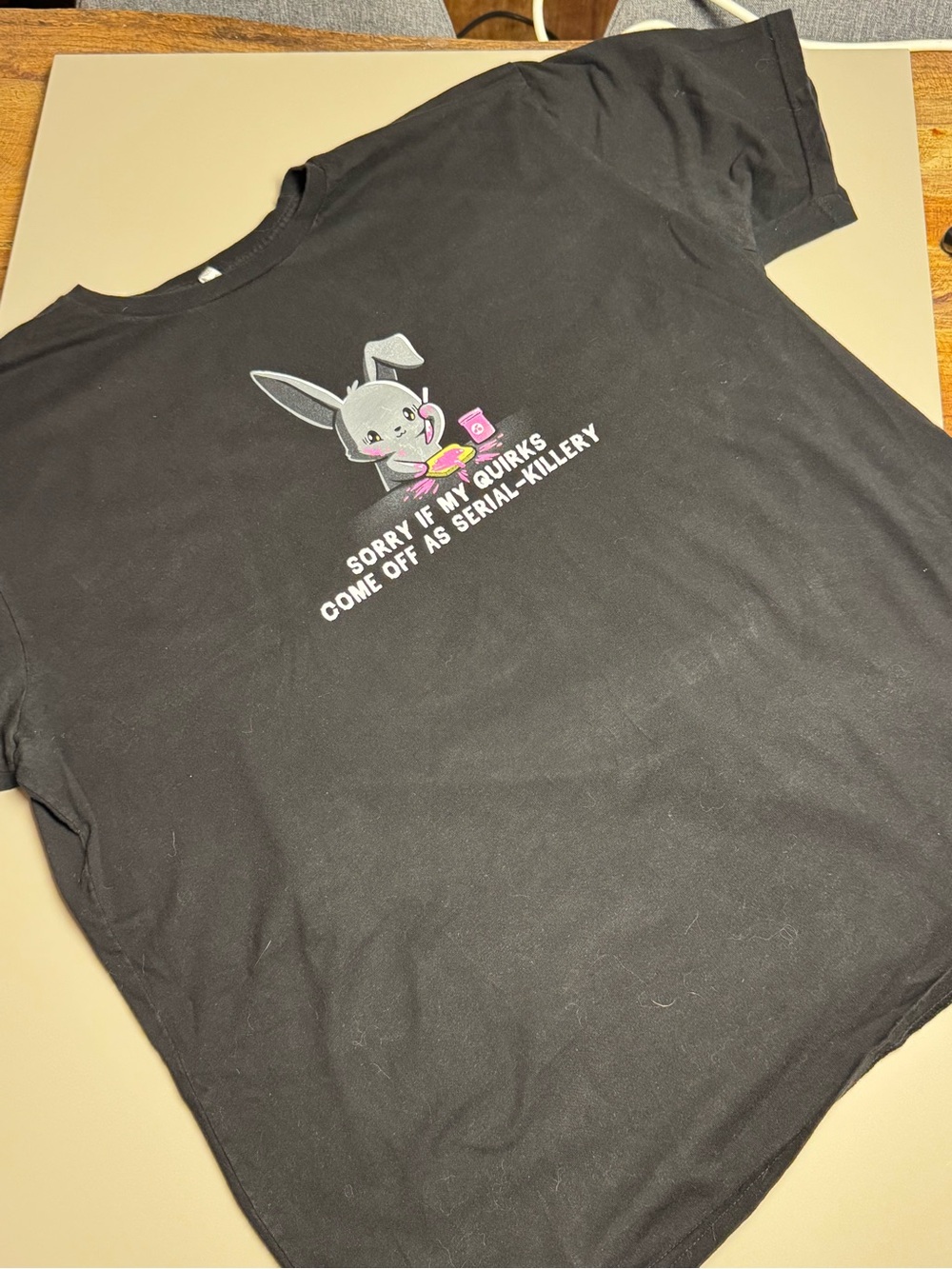 Those are SOME quirks! Black XL tee featuring cute bunny serial unaliver - Picture 2 of 2